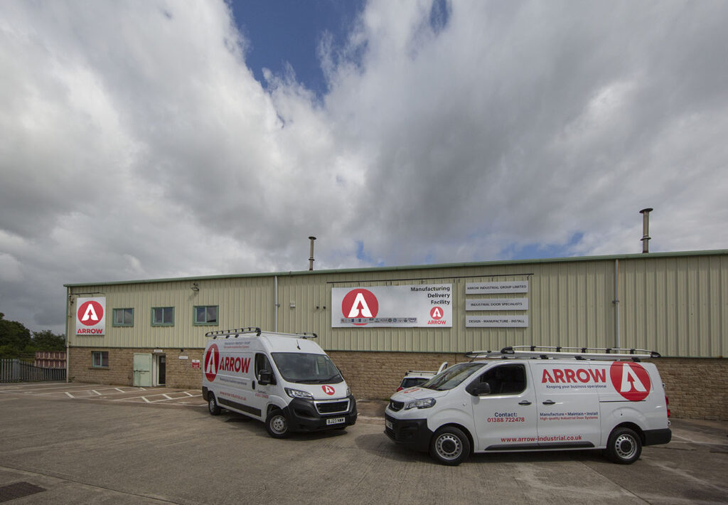 Arrow Vans parked in front of Arrow warehouse